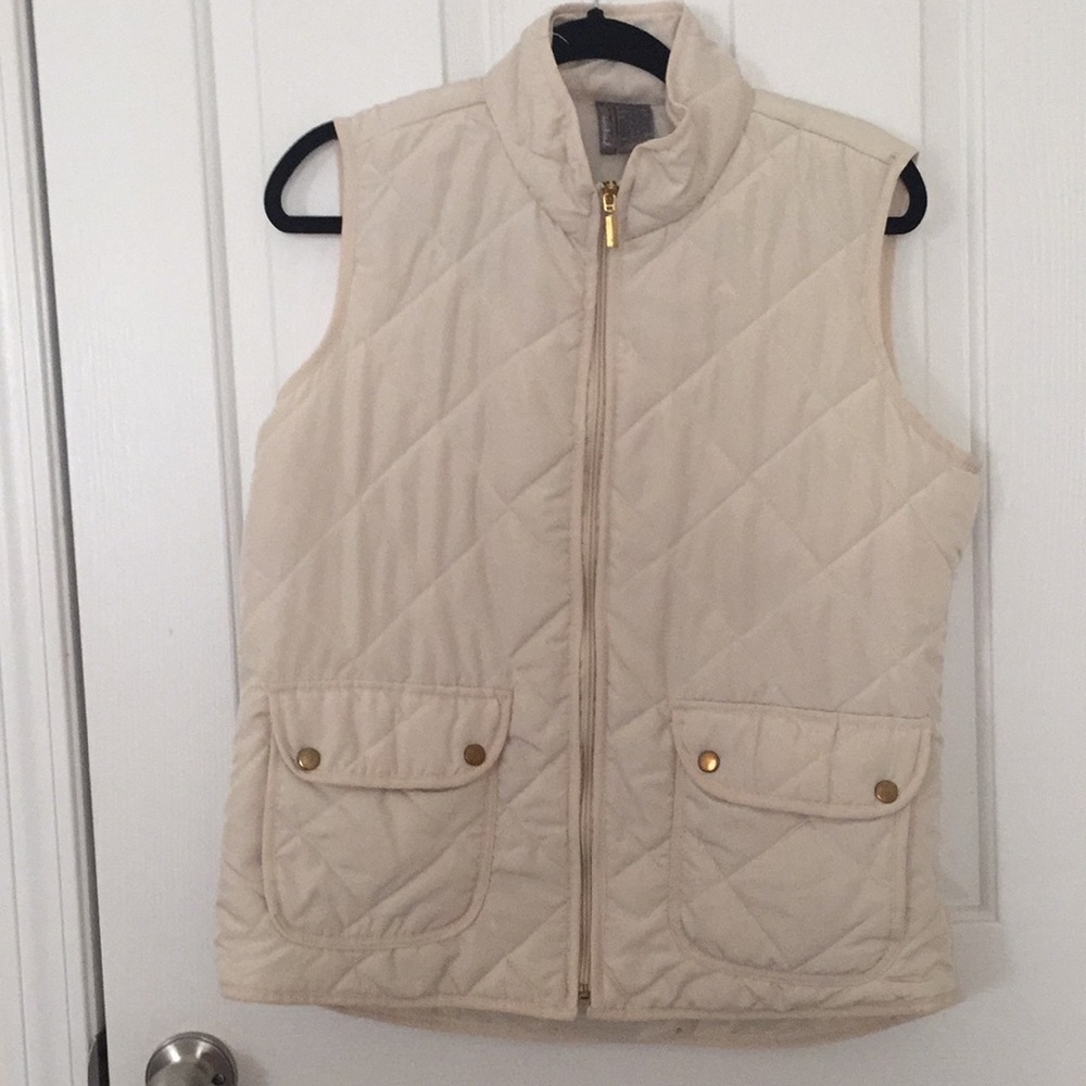 Beige vest.